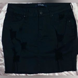 Black Jean skirt ripped style.